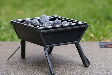 Folding charcoal grill
